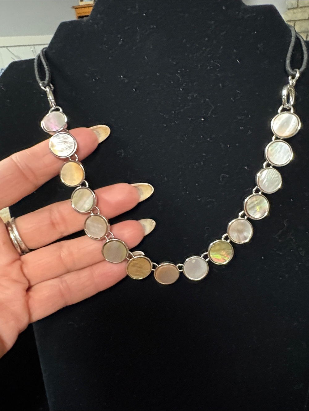 Multicolor Shell Disc Necklace - Women Jewelry with black elastic goes overhead.